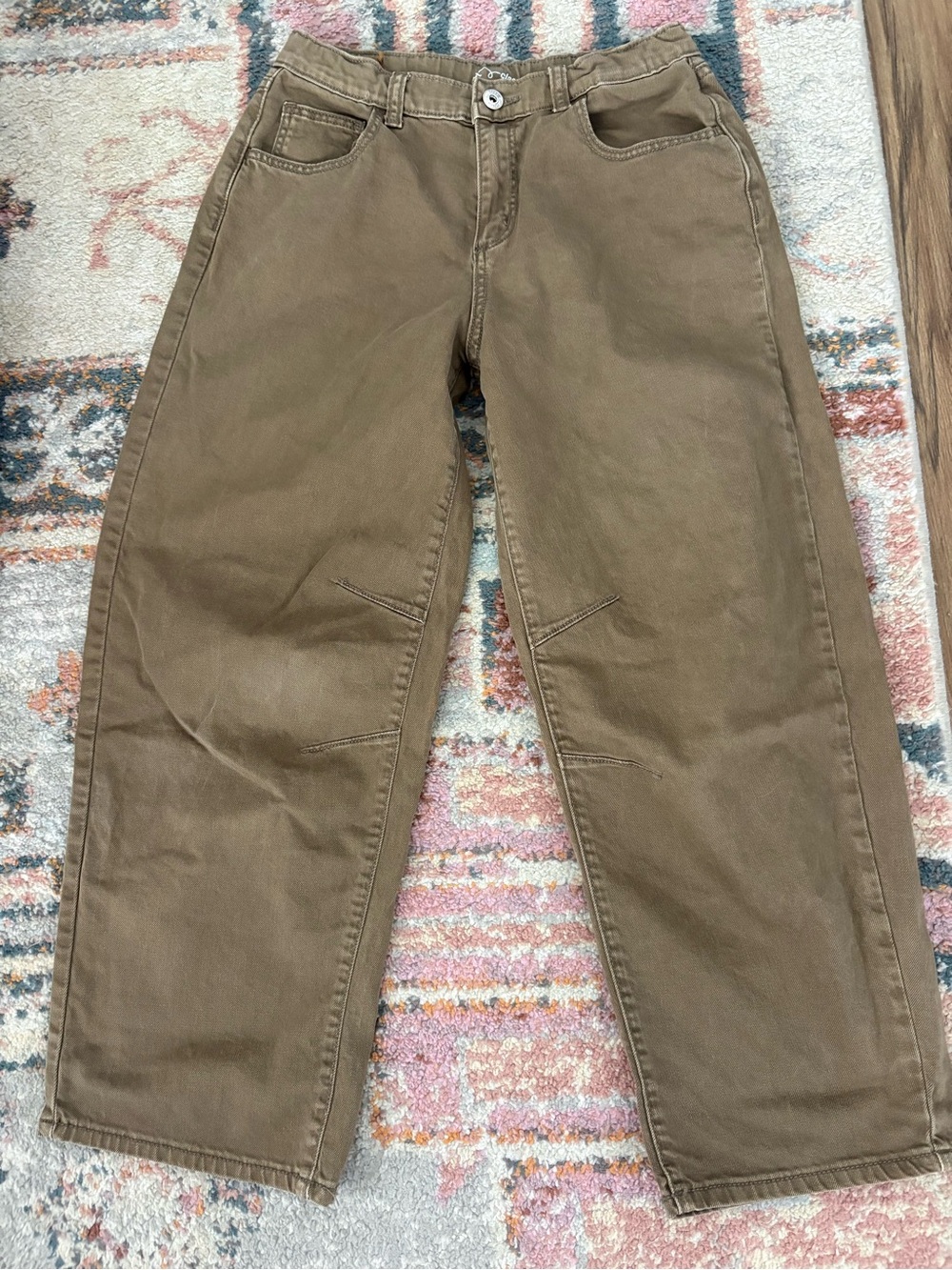 Brown denim barrel jeans.